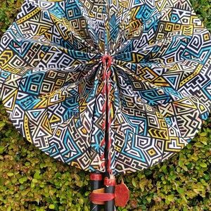 African Ankara Print Folding Fan . Made With Leather Handles .